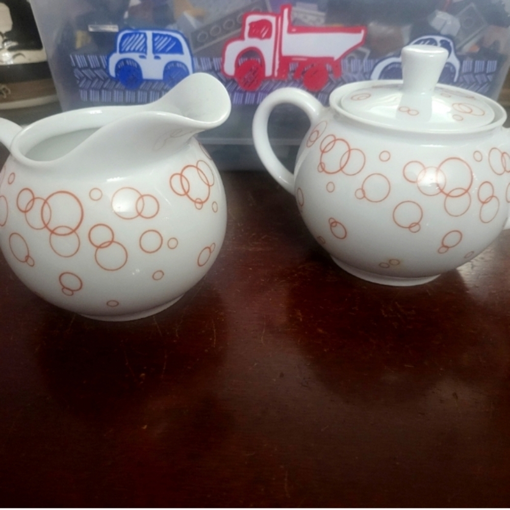 Elegant White and Orange Tea Set